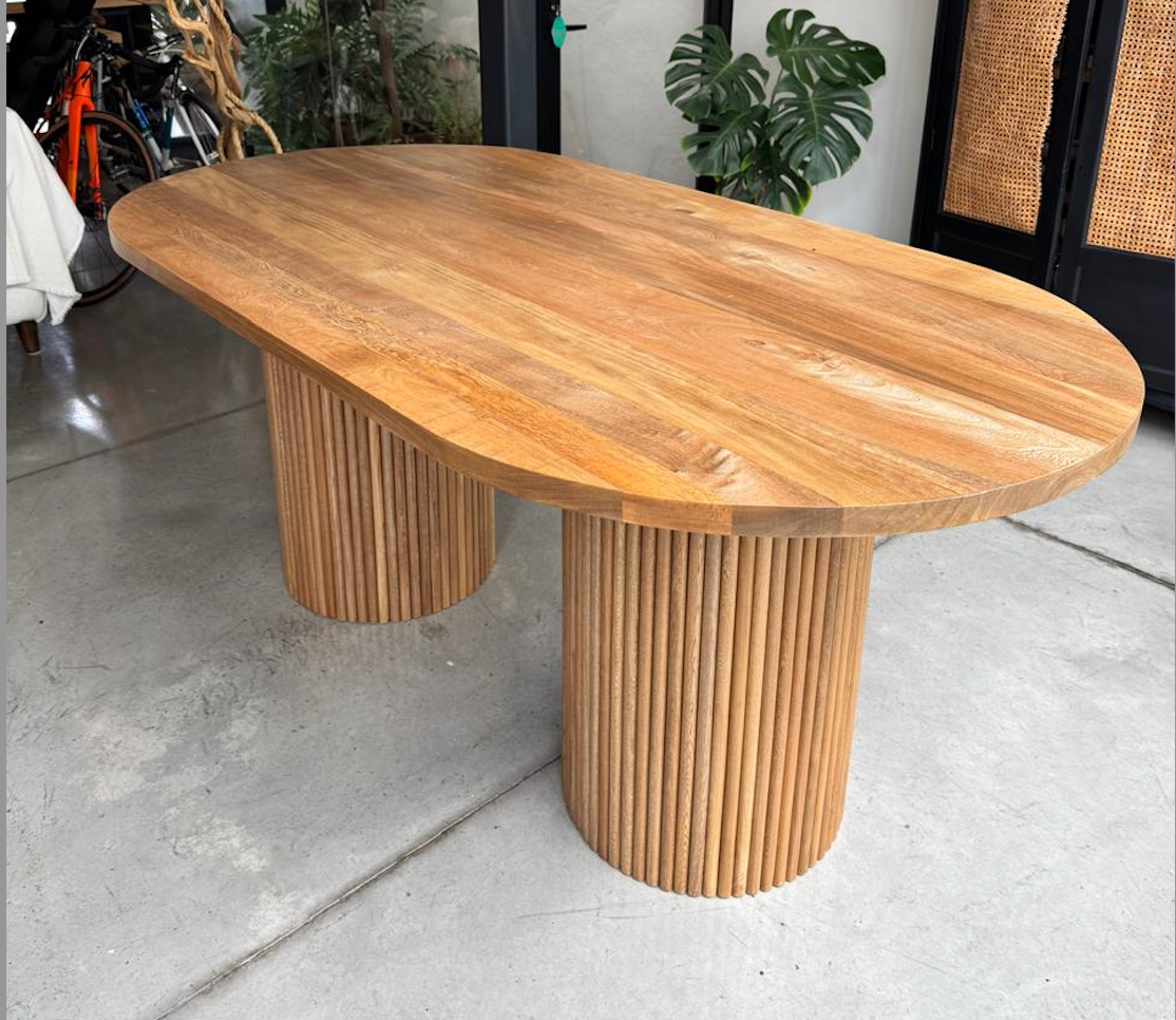Mesa de comedor ovalada dos pedestales